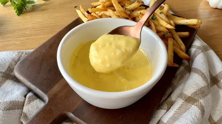 Aioli in a bowl with french fries