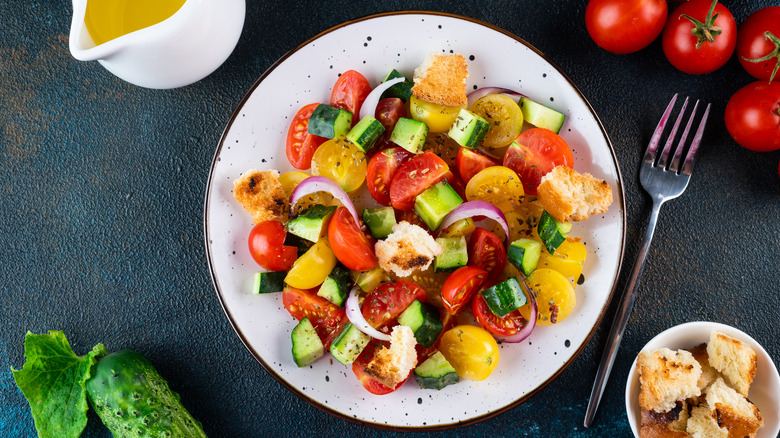 Round white plate of panzanella salad
