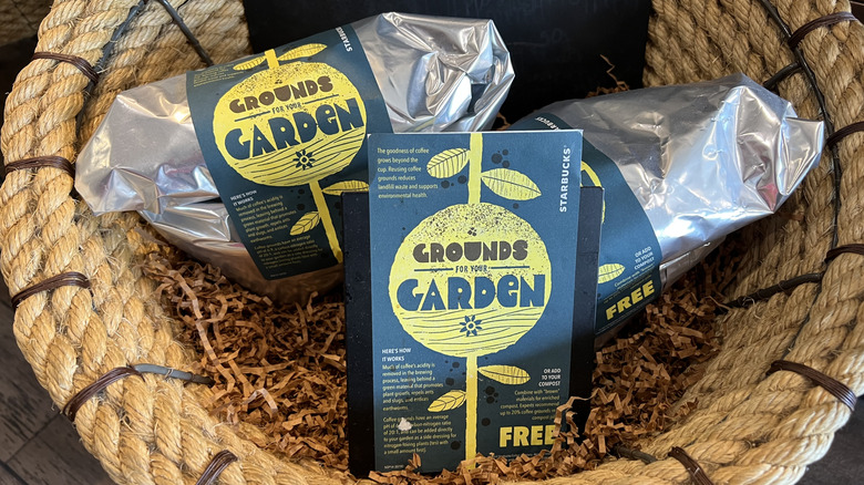 Starbucks displays used coffee grounds for customers to use in their gardens.