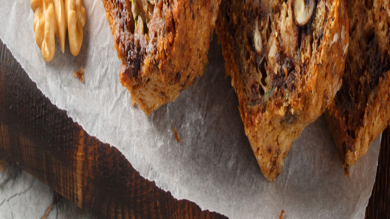 sliced loaf of banana bread on board