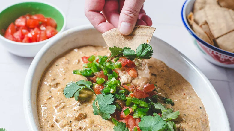 Queso dip with cracker
