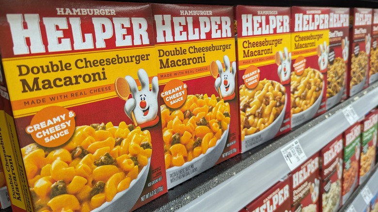 Boxes of Hamburger Helper on shelf