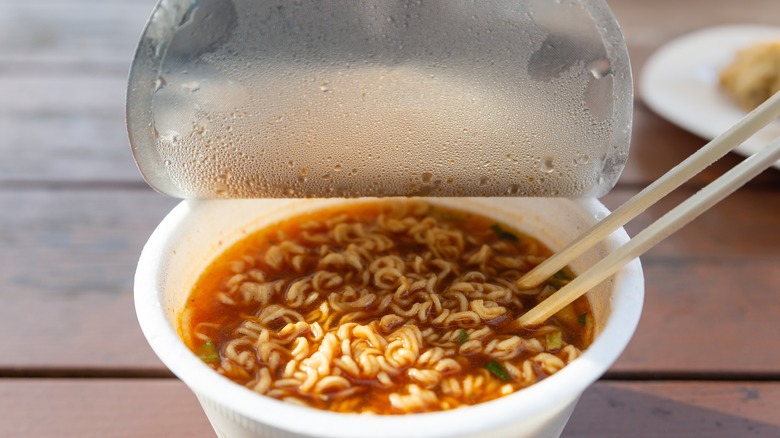 Instant noodles with chopsticks on a table