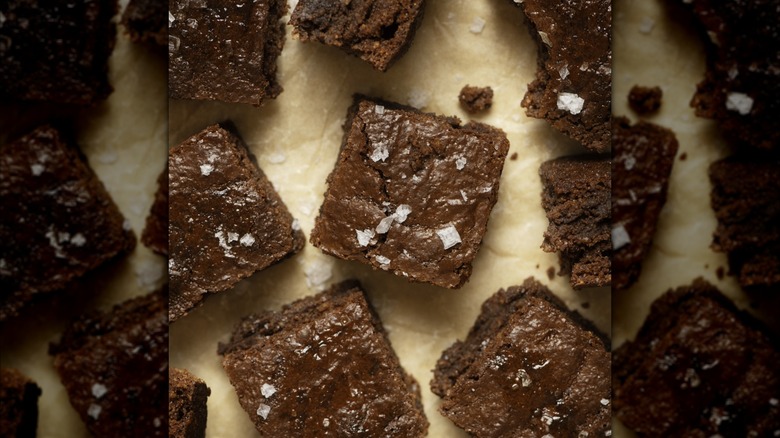 Brownies with sea salt on parchment