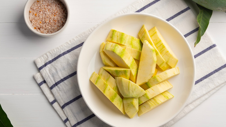 Raw green mango with chile salt