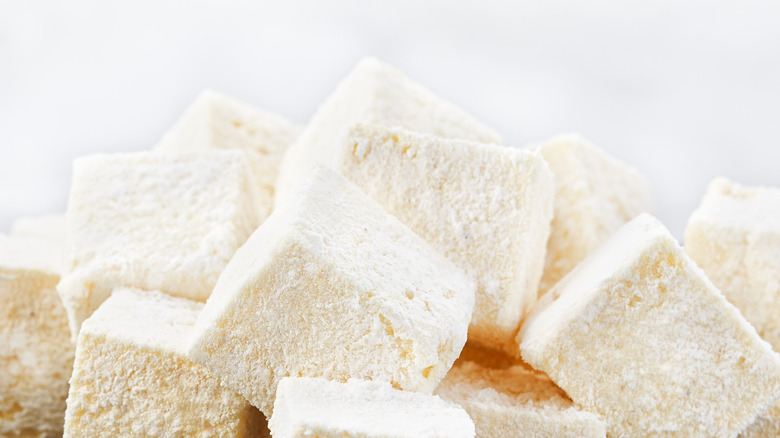 Stack of marshmallows on a white background