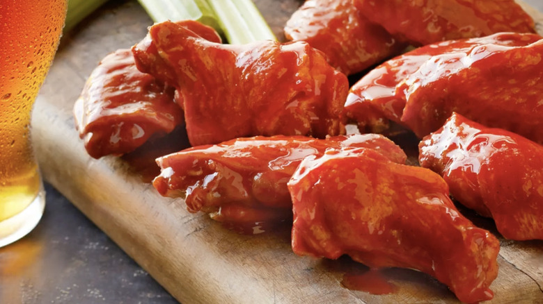 Chicken wings on plate with celery