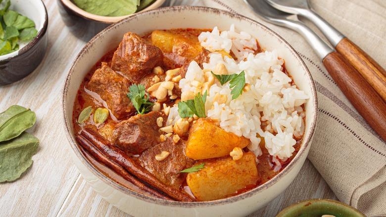 A bowl of Massaman curry with rice