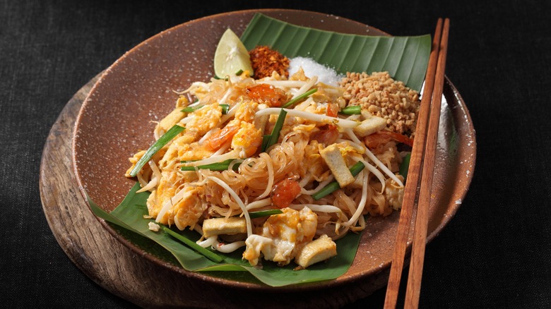 A plate of pad Thai noodles