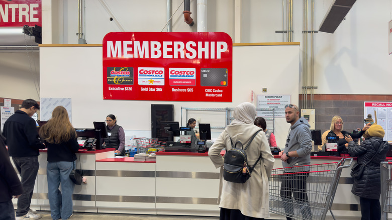 Customer service representatives assisting Costco members