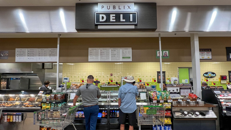 Two men ordering at the Publix Deli counter