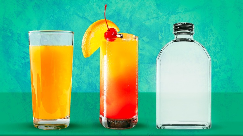 Tequila Sunrise cocktail with glass of orange juice and bottle of tequila