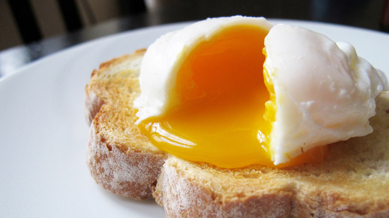Soft poached egg on toast