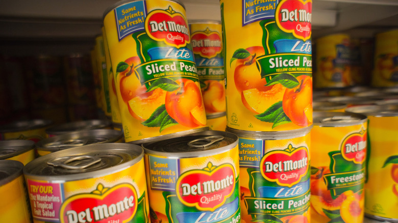 Canned peaches in a grocery store