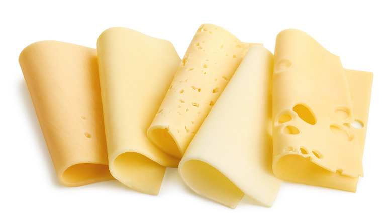 Cheeses rolled in half