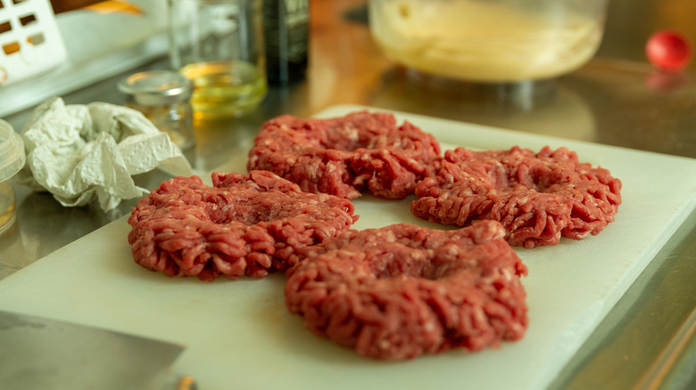 Dimpled raw burger patties