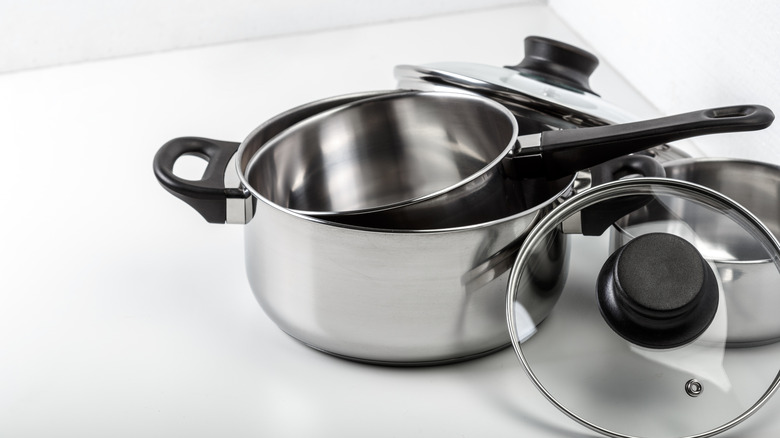 Stainless steel pans on a countertop
