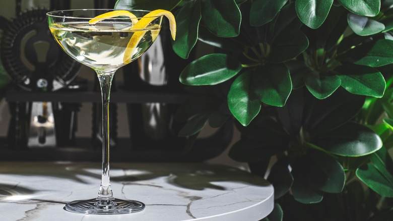 martini with lemon peel garnish