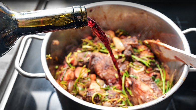 Deglazing a pan with red wine