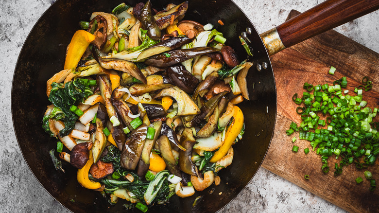 Stir-fry with green onion garnish