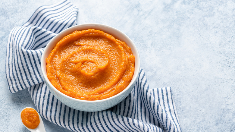 Squash purée in a white bowl
