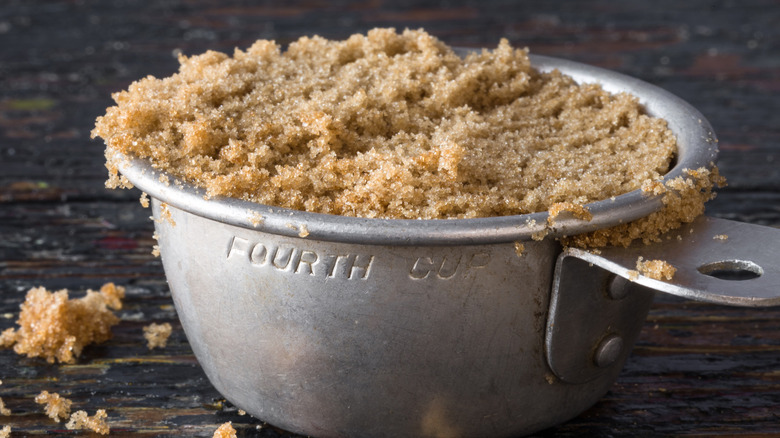 Brown sugar in a metal cup