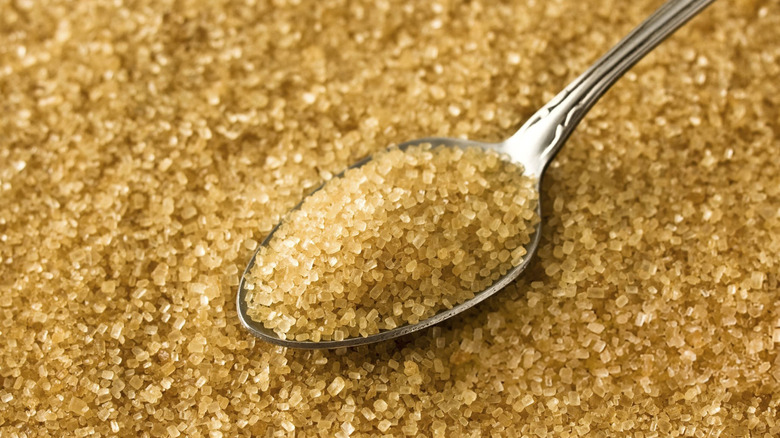 Demerara sugar on a spoon