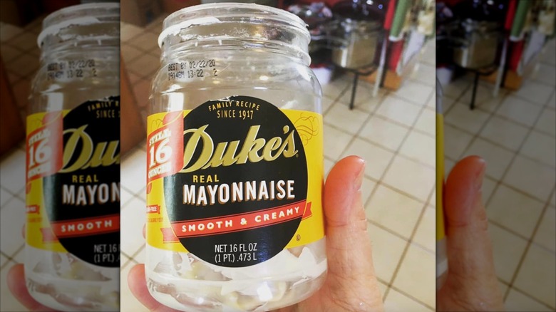up close of almost empty Duke's Mayo jar