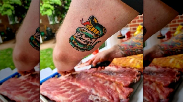 up close of Duke's Mayo tattoo on man's arm