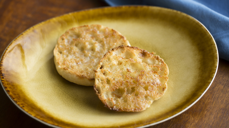 Toasted English muffin slices on a plate