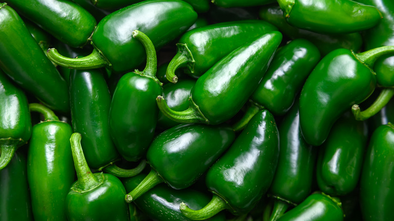 Whole jalapeños on a table