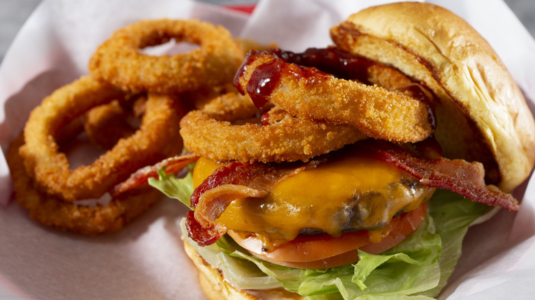 Burger topped with onion rings