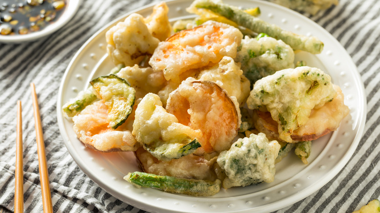 Tempura-fried veggies on a plate