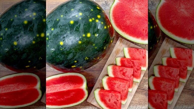 A whole moon and stars watermelon next to cut pieces on a table