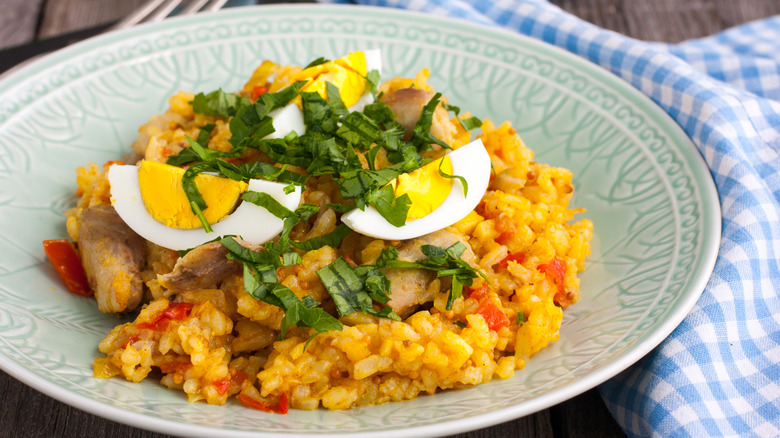 A bowl of kedgeree on a table