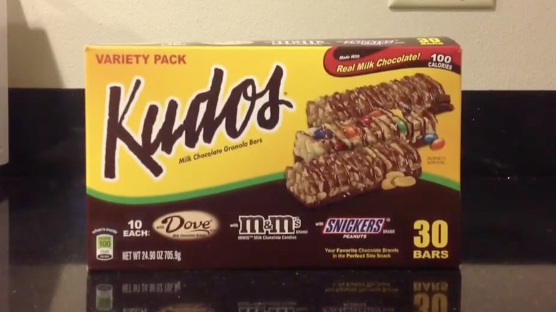 A box of Kudos granola bars on a kitchen counter