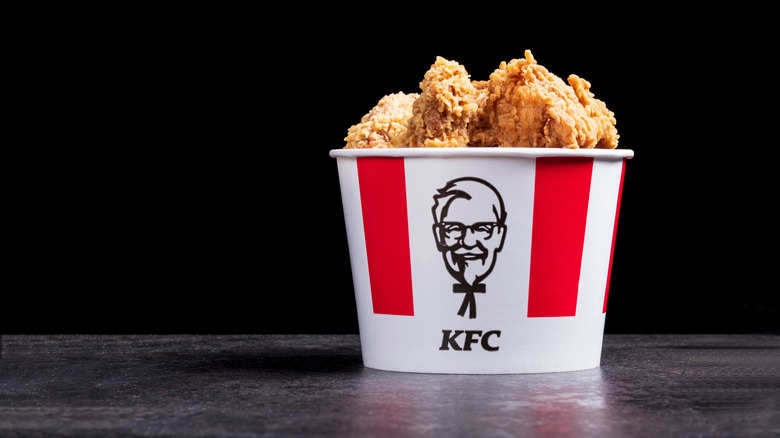 bucket of KFC chicken on gray table