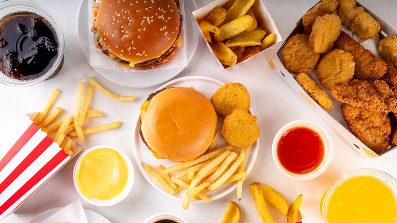 variety of fast food items on white table
