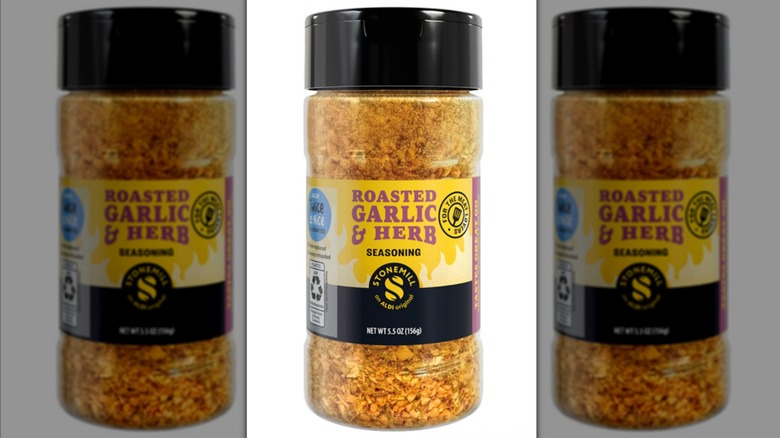 A bottle of Stonemill Roasted Garlic & Herb seasoning