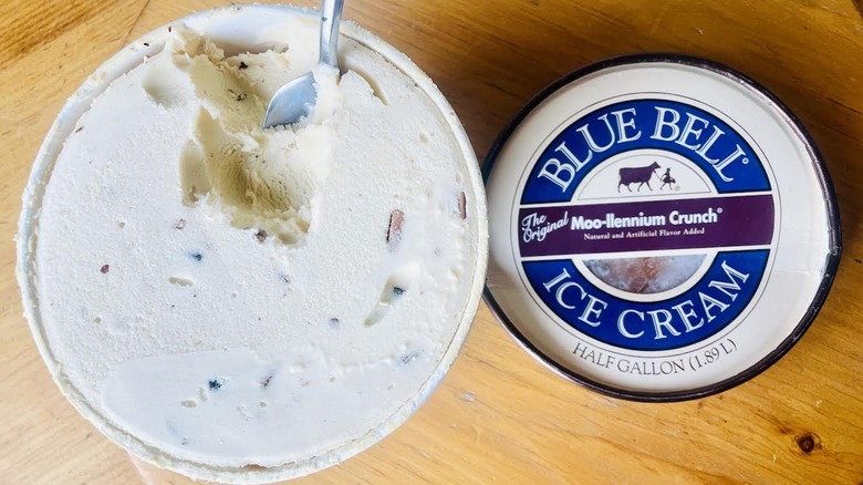 Overhead view of opened carton of Blue Bell Moo-Llenium Crunch Ice Cream