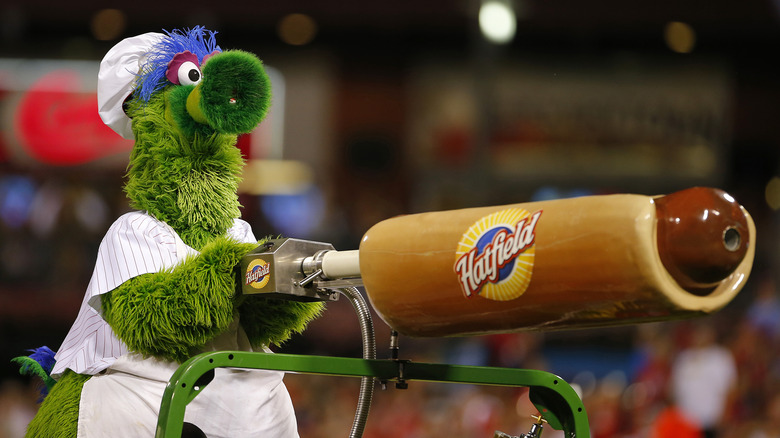 Phillies Phanatic mascot holding a fake hot dog