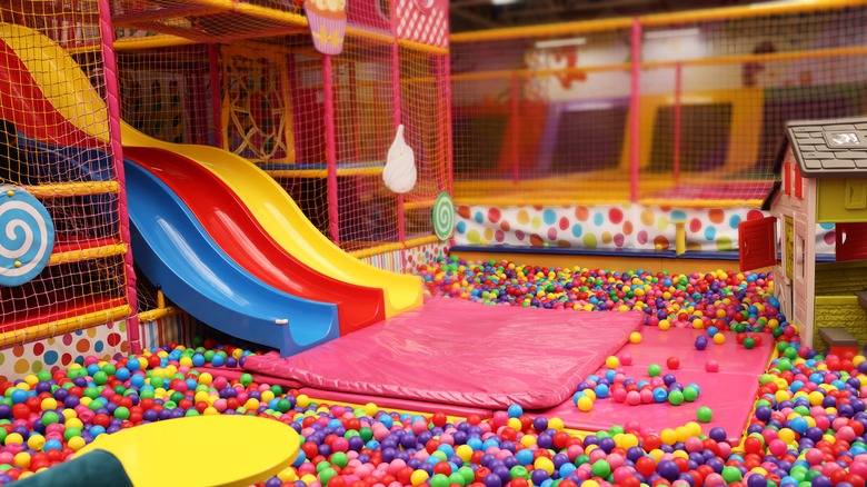 colorful slides going into ball pit