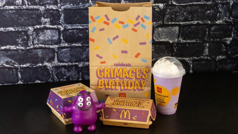 McDonald's Grimace Birthday Meal on black table