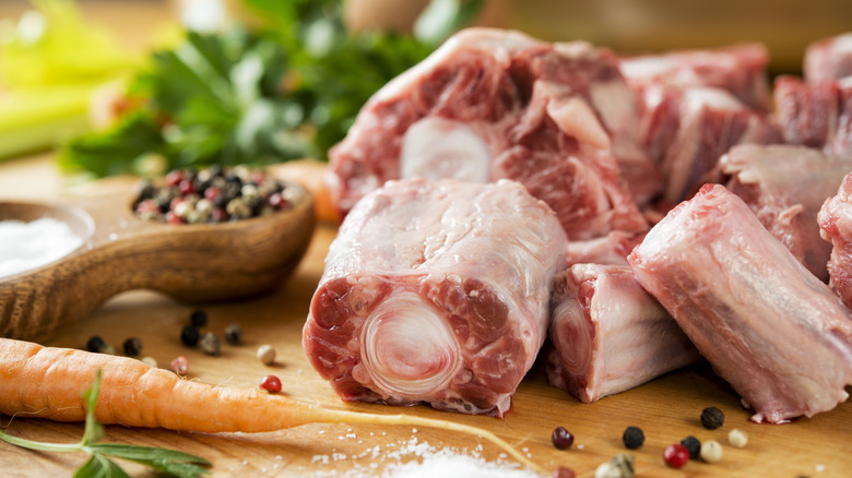 Raw oxtails on a cutting board