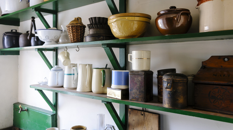 Green painted kitchen shelves