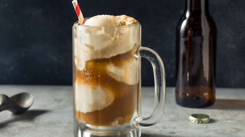 frosty root beer glass with vanilla ice cream