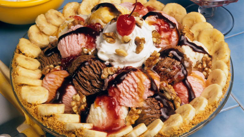 pie made with layers of ice cream, fruit, and a graham cracker crust