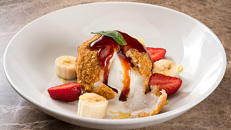scoop of battered and fried ice cream with fruit