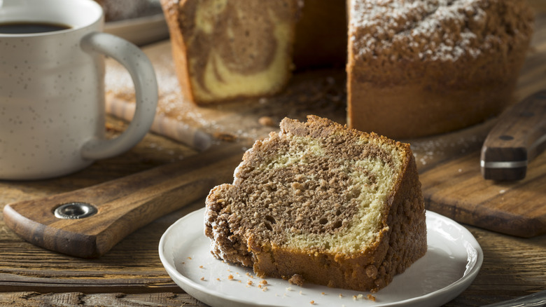 Cinnamon Swirl Coffee Cake is served with a cup of coffee