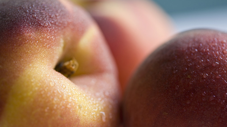 Closeup of whole peaches